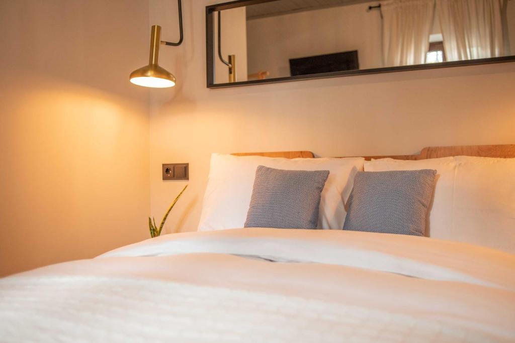 Postel nebo postele na pokoji v ubytování Philos Guesthouse