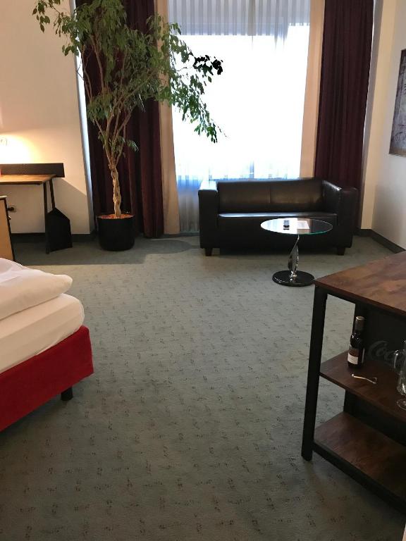Postel nebo postele na pokoji v ubytování Good Morning + Leipzig