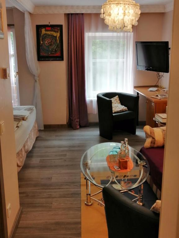 TV a/nebo společenská místnost v ubytování Landhaus Gritschacher