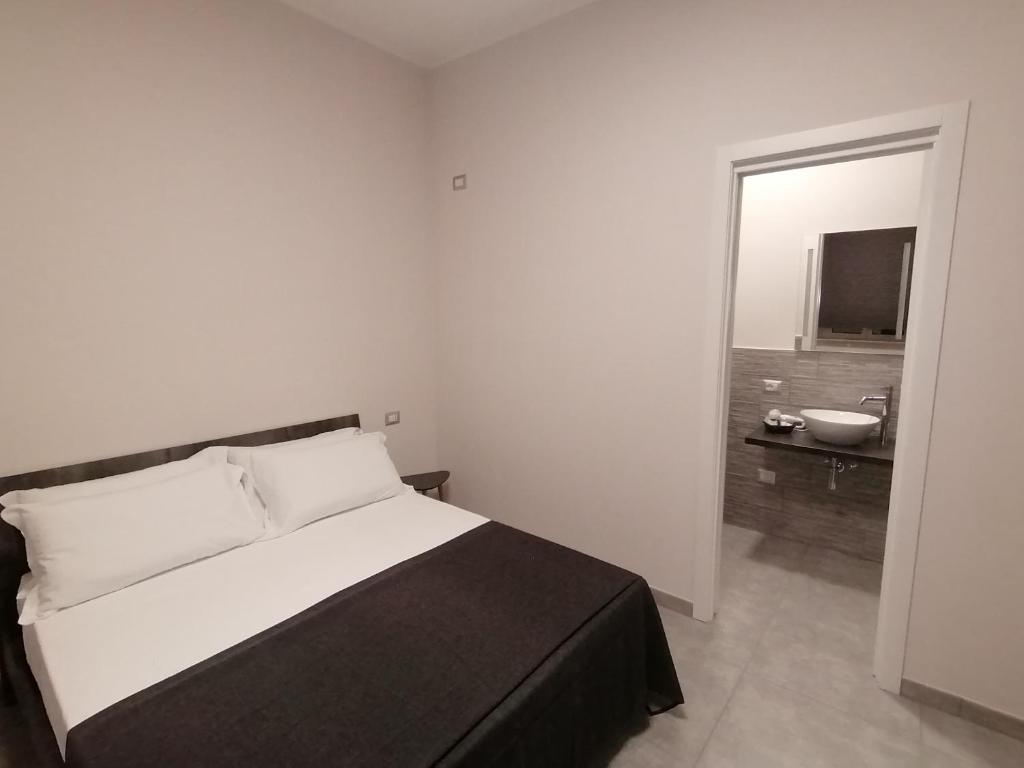 Postel nebo postele na pokoji v ubytování Grenada Home