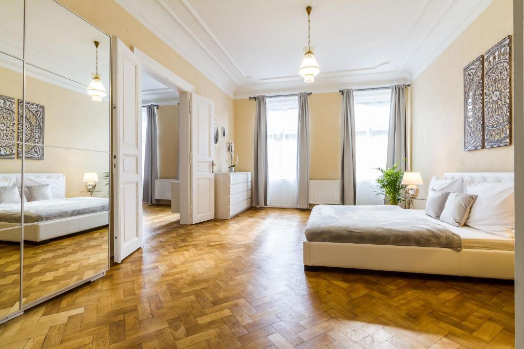 Postel nebo postele na pokoji v ubytování 2bds apartment in UJEZD - P14
