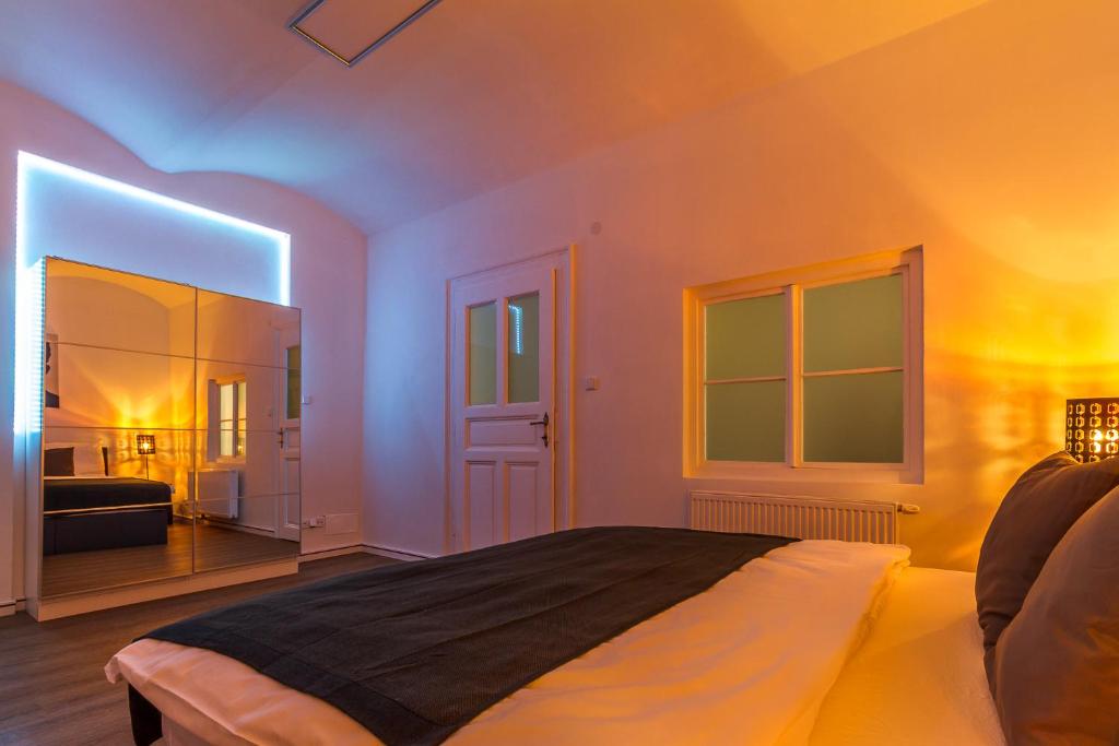 Postel nebo postele na pokoji v ubytování 2bds apartment in UJEZD - P14