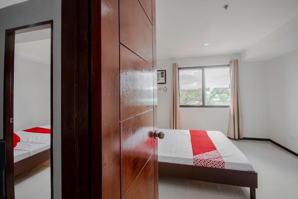 Postel nebo postele na pokoji v ubytování Cornerstone Manor Inn