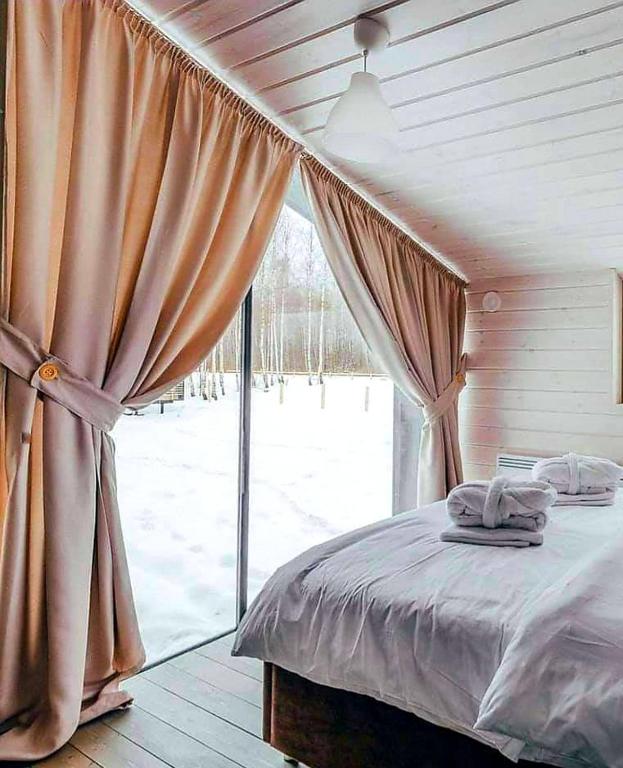 Postel nebo postele na pokoji v ubytování Bohemian Homes - Buddha