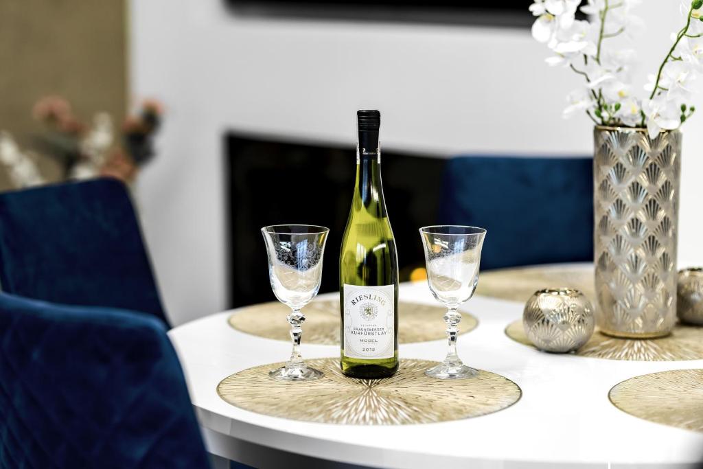 Nápoje v ubytovaní Apartament Zacisze z prywatną sauną