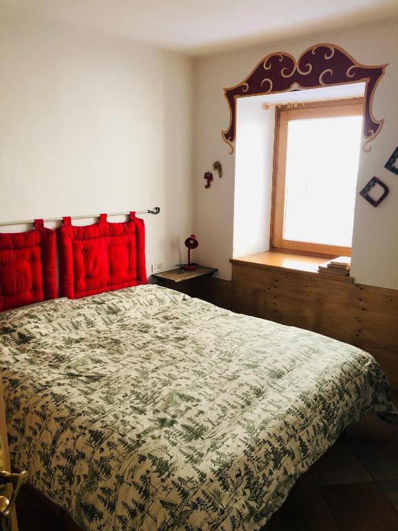 Postel nebo postele na pokoji v ubytování iRIVAS Lodge