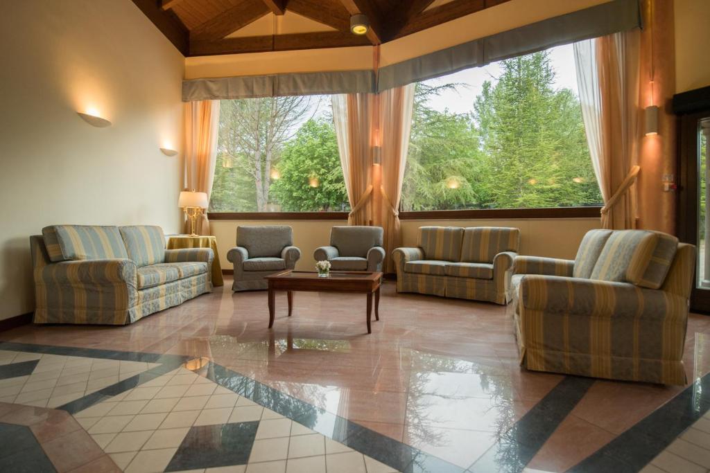 Posezení v ubytování Hotel Le Grotte