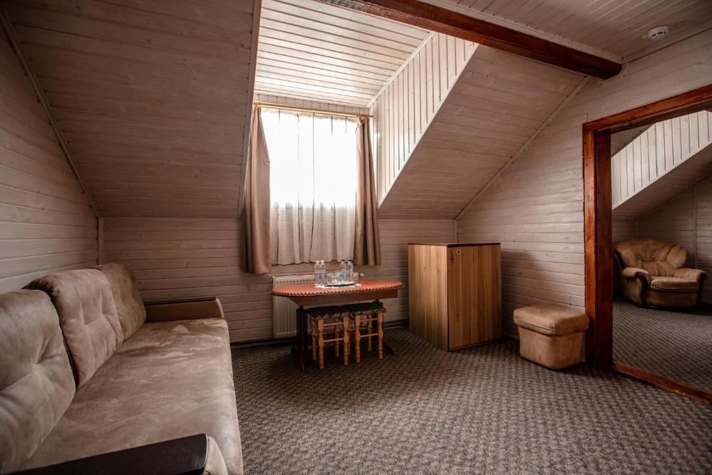 Posezení v ubytování Dovbushanka Hotel
