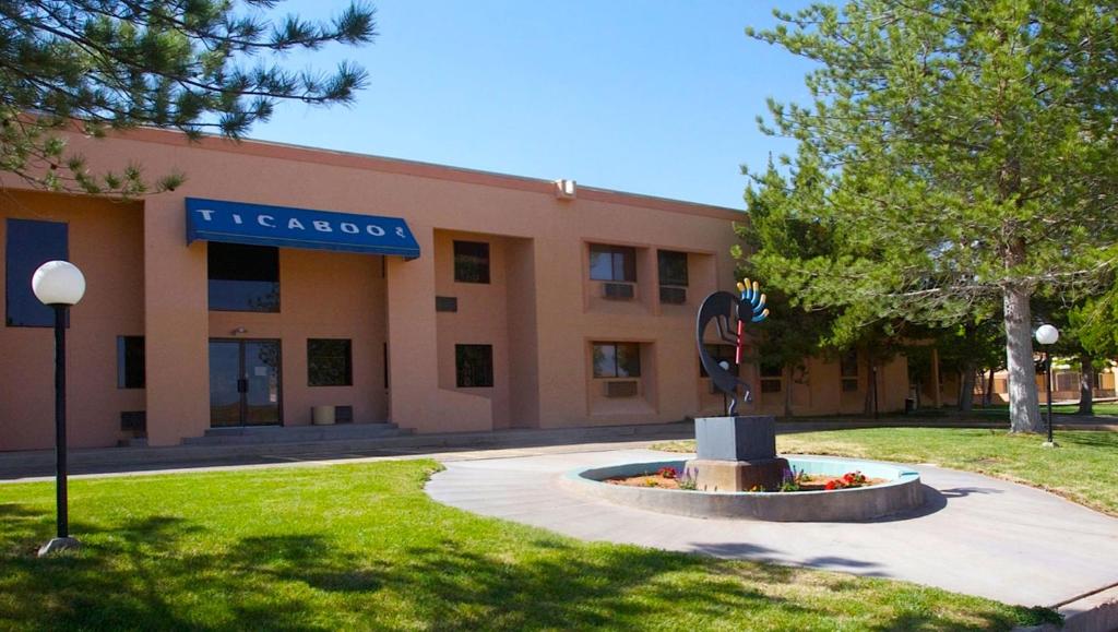 a building with a statue in front of it at Ticaboo Lodge in Ticaboo