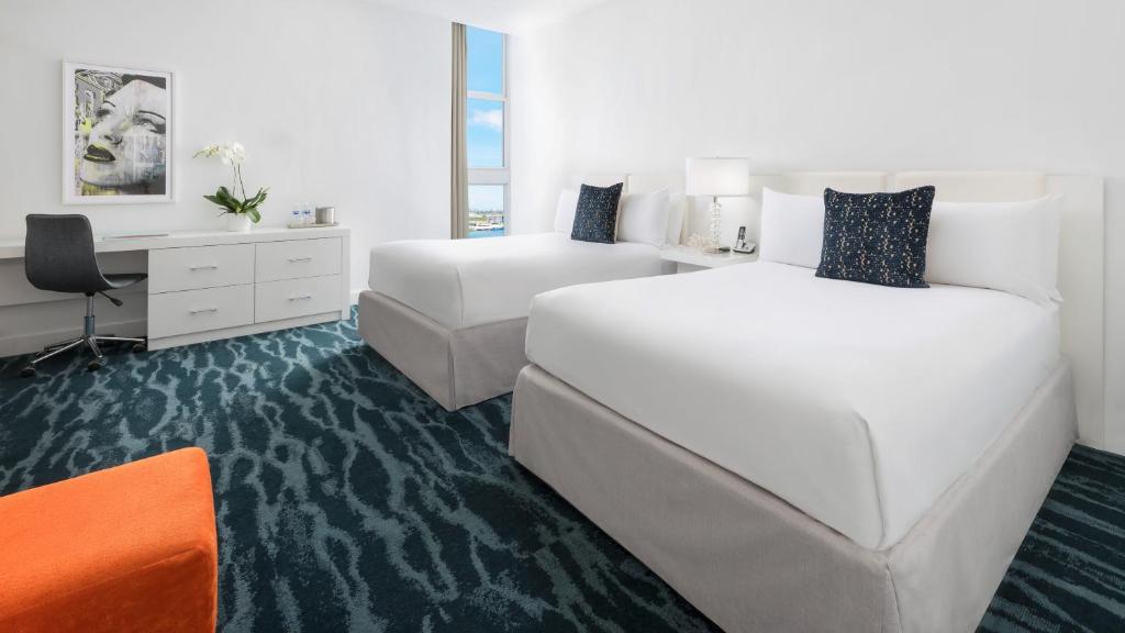 Postel nebo postele na pokoji v ubytování YVE Hotel Miami
