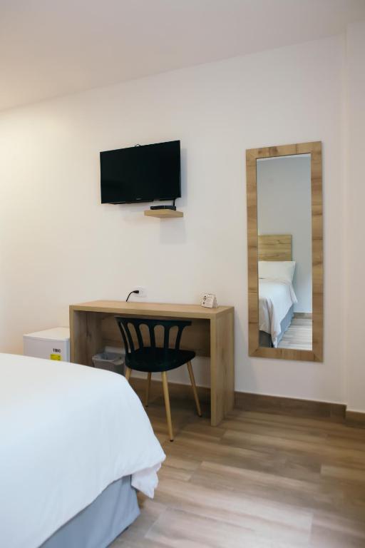 Postel nebo postele na pokoji v ubytování The Park Hotel