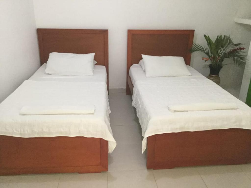 Postel nebo postele na pokoji v ubytování Hotel El Don