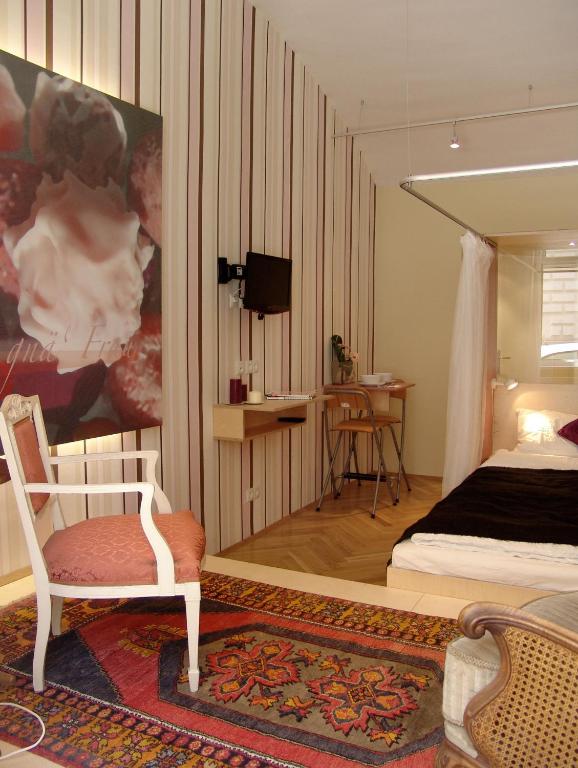 TV a/nebo společenská místnost v ubytování WANZ'inn Design Appartements