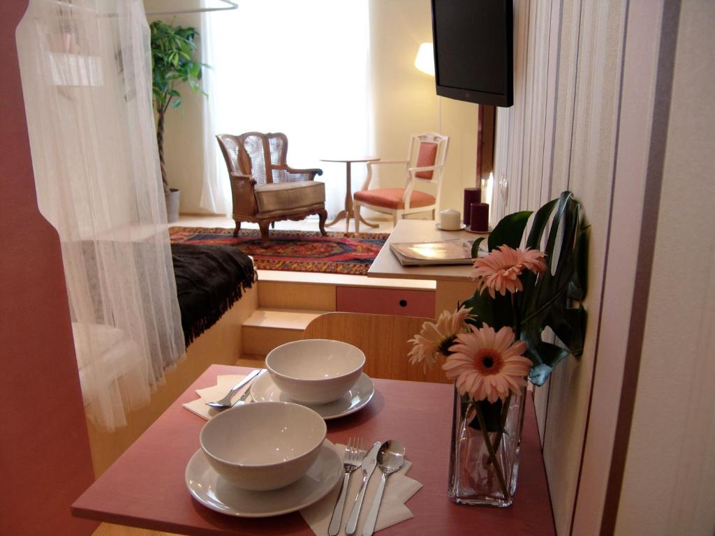 TV a/nebo společenská místnost v ubytování WANZ'inn Design Appartements