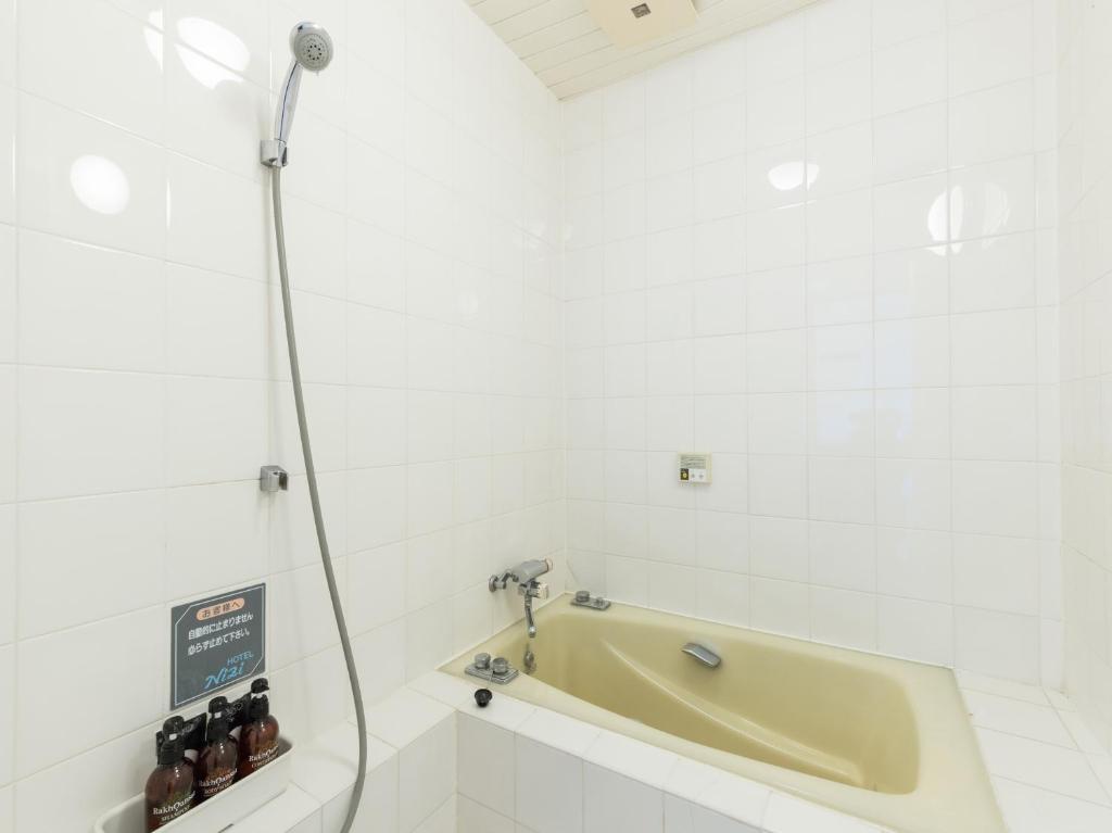 Koupelna v ubytování Tabist Hotel Nizi Fuefuki Misaka