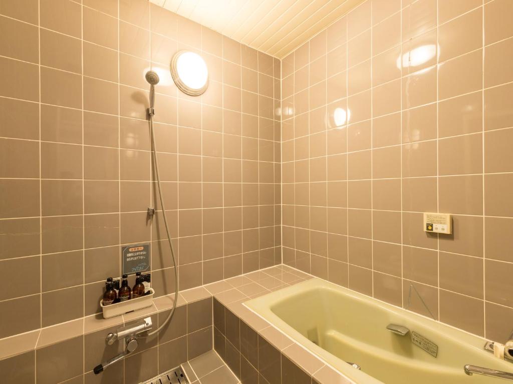 Koupelna v ubytování Tabist Hotel Nizi Fuefuki Misaka