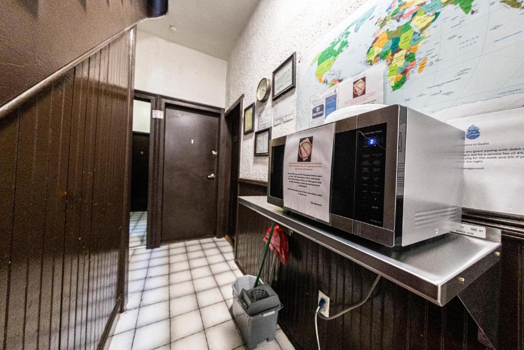 Kuchyň nebo kuchyňský kout v ubytování Shefah Hotel