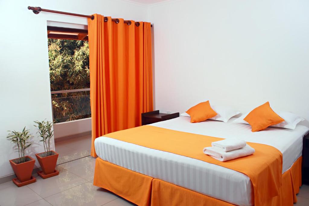 Lova arba lovos apgyvendinimo įstaigoje Hotel Tierra Linda