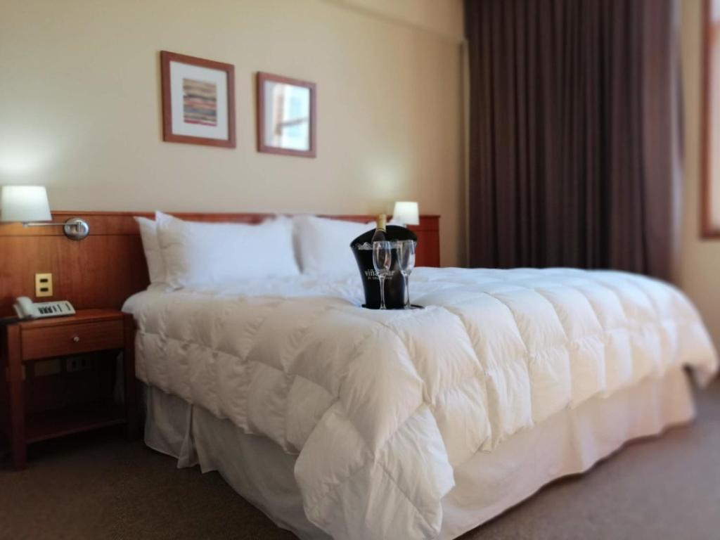 Cama o camas de una habitación en Gran Hotel Isabel Riquelme