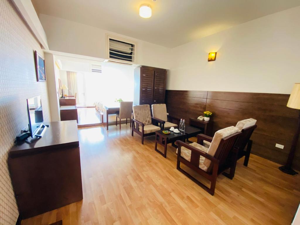 Postel nebo postele na pokoji v ubytování Khách sạn Công Đoàn Quảng Bá