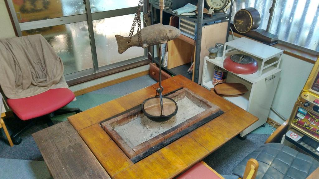 Posezení v ubytování 田舎の宿 吉田屋
