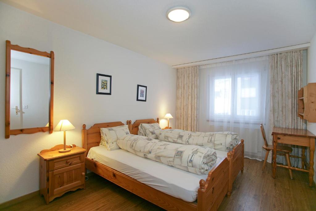 Postel nebo postele na pokoji v ubytování Baron / Baronesse Apartments