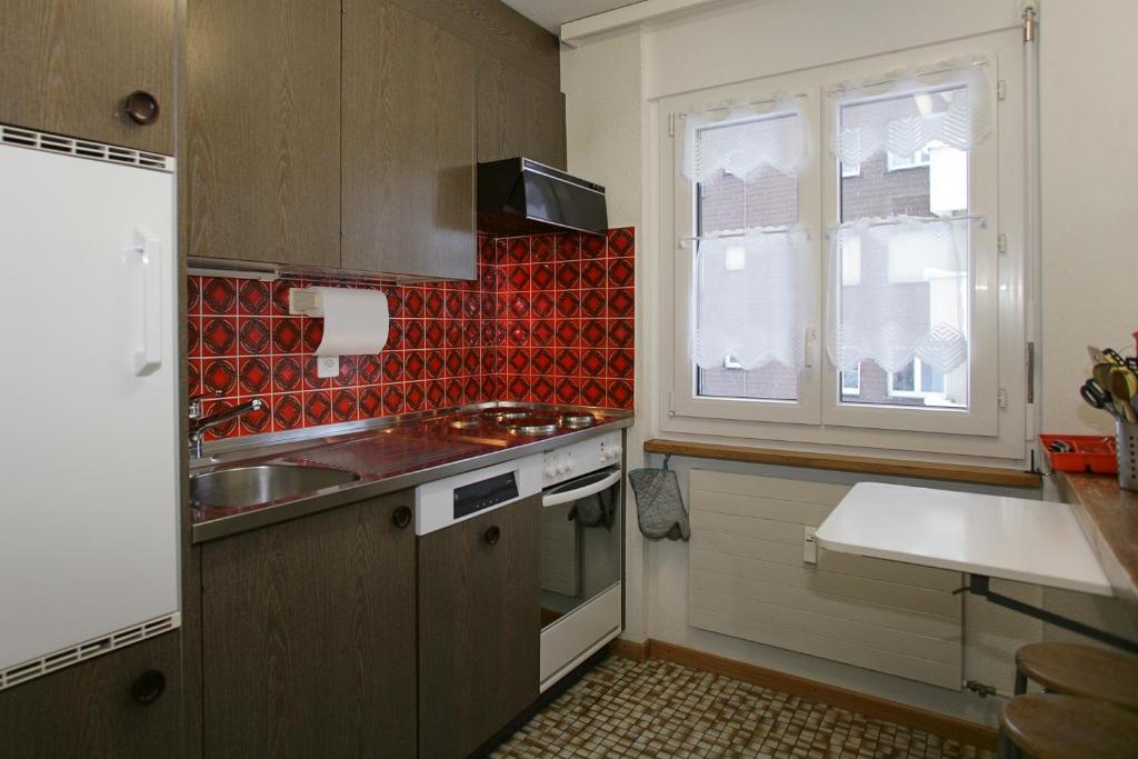 Kuchyň nebo kuchyňský kout v ubytování Baron / Baronesse Apartments