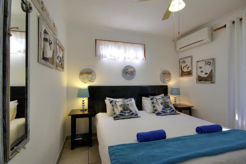 Postel nebo postele na pokoji v ubytování St Lucia Ocean View Lodge
