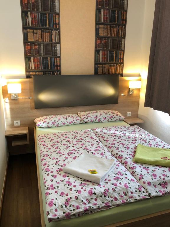 Postel nebo postele na pokoji v ubytování Hotel Baccara