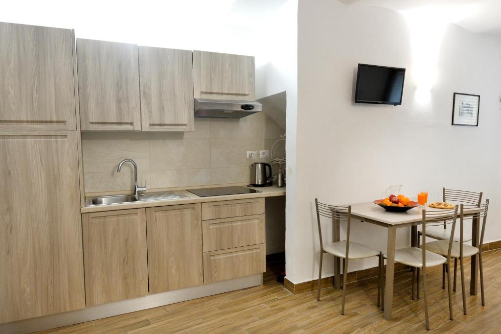 Kuchnia lub aneks kuchenny w obiekcie Perugia Apartments