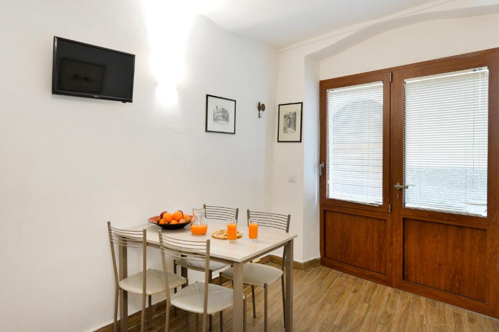 Telewizja i/lub zestaw kina domowego w obiekcie Perugia Apartments
