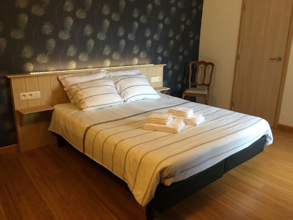 Postel nebo postele na pokoji v ubytování Auberge Saint-Martin