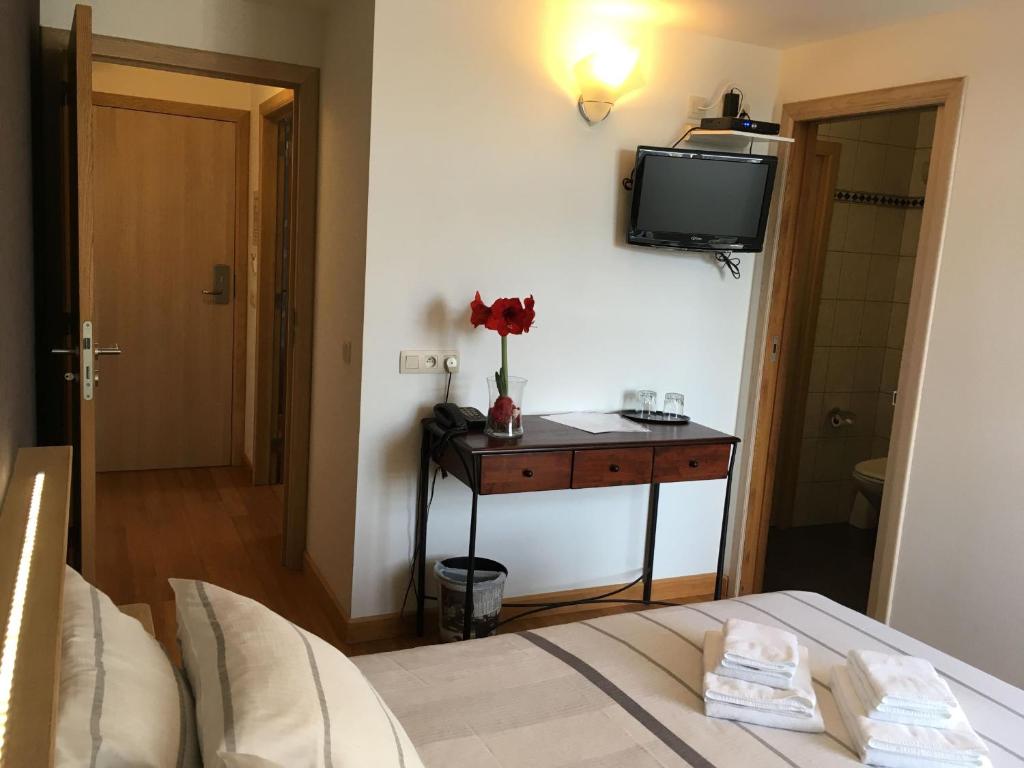 Postel nebo postele na pokoji v ubytování Auberge Saint-Martin