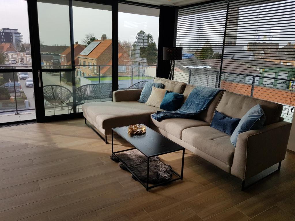 Posezení v ubytování Vakantiewoning Ijzerfront 14-18