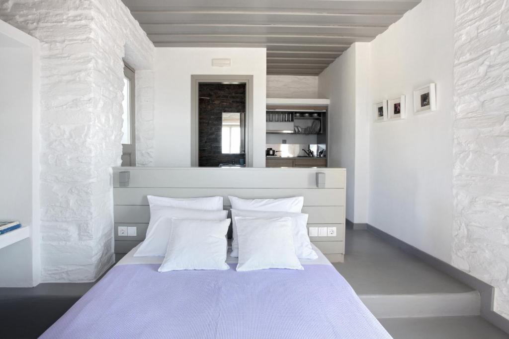 Postel nebo postele na pokoji v ubytování Kea Village Suites & Villas