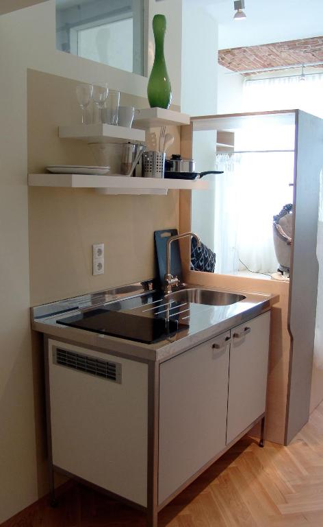 Kuchyň nebo kuchyňský kout v ubytování WANZ'inn Design Appartements