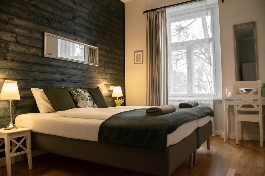 Postel nebo postele na pokoji v ubytování Dunna