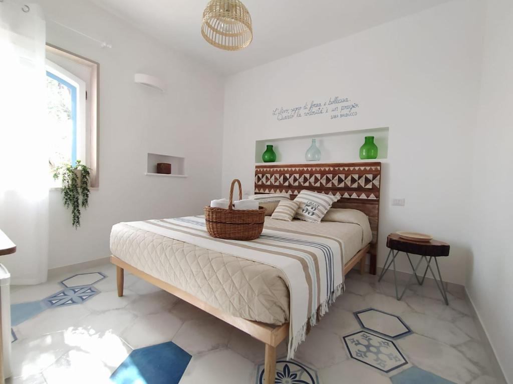 Postel nebo postele na pokoji v ubytování Dimora Mediterranea