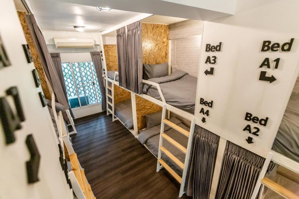 Postel nebo postele na pokoji v ubytování My Way Hostel Chiang Mai