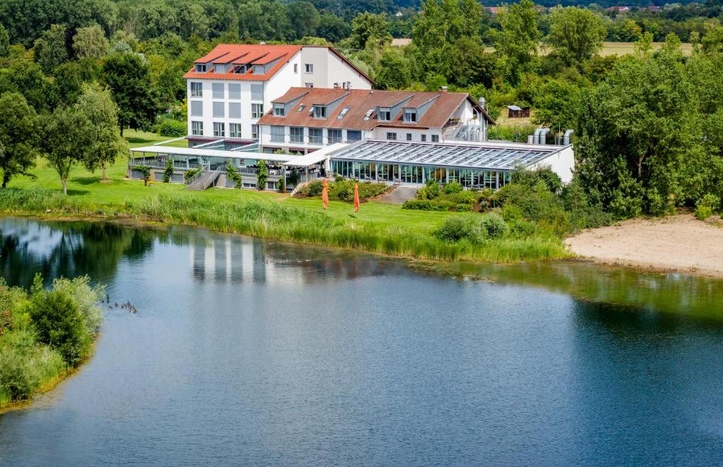 an aerial view of a building next to a river at Hotel Darstein in Mannheim