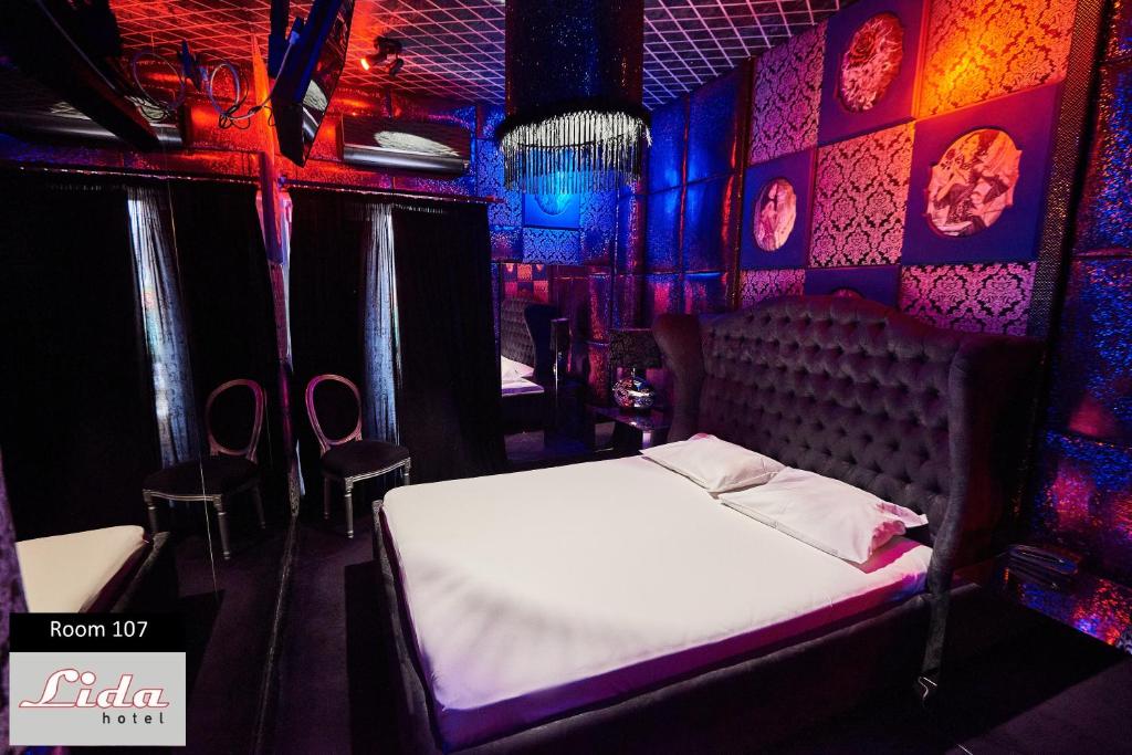 Postel nebo postele na pokoji v ubytování Lida Hotel
