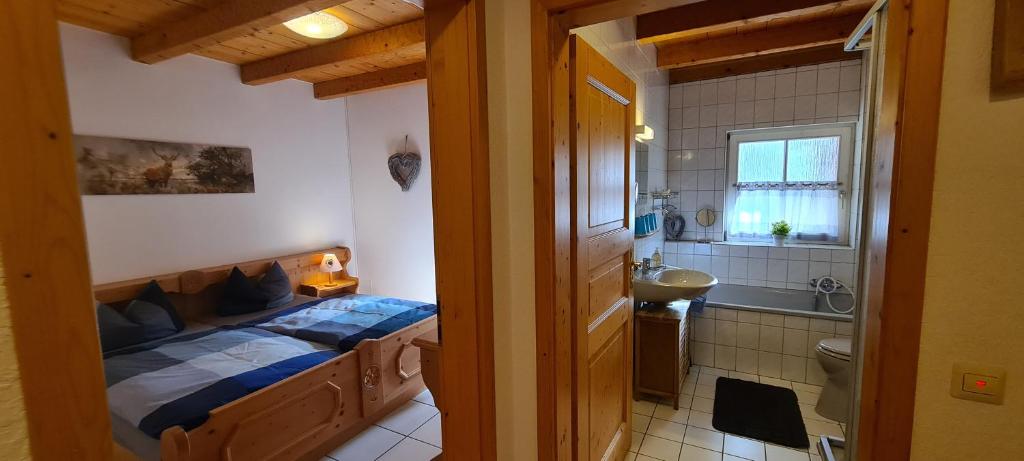 Postel nebo postele na pokoji v ubytování Ehrenmättlehof Faißt
