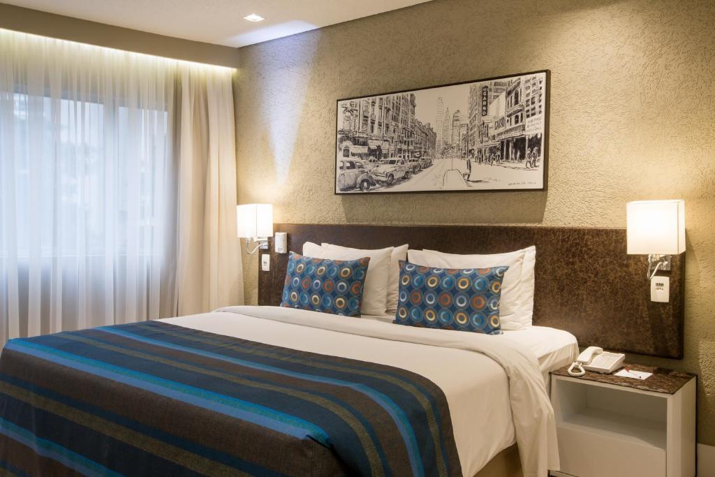Tempat tidur dalam kamar di Hotel Transamerica Berrini