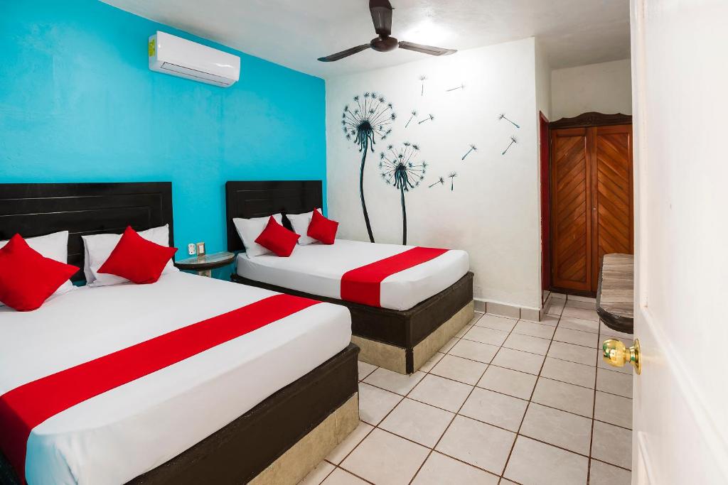 Postel nebo postele na pokoji v ubytování Hotel América