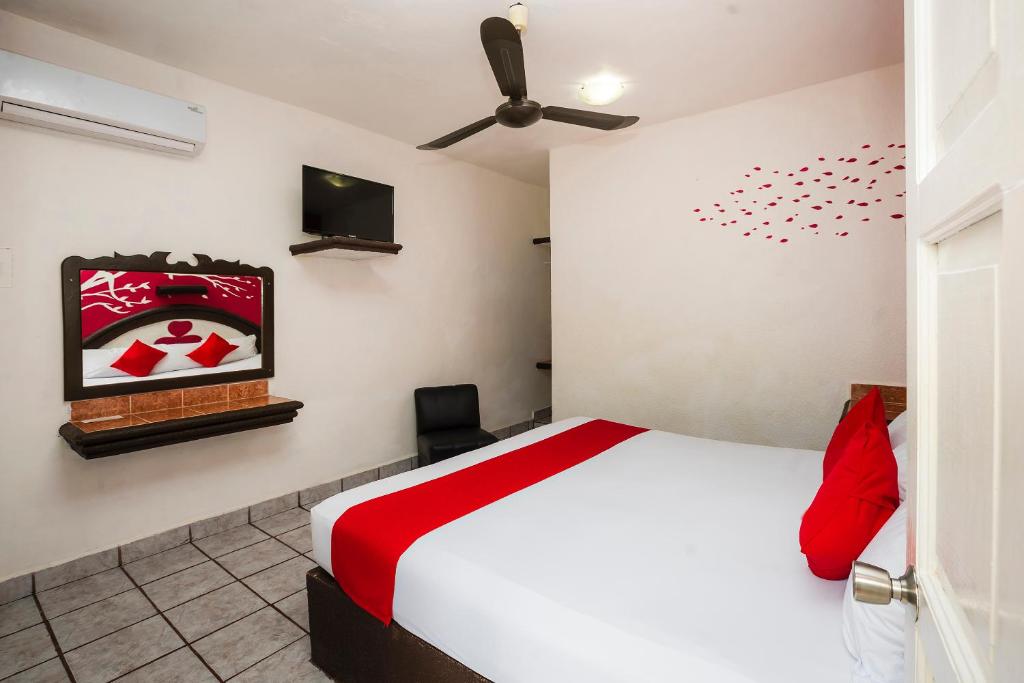 Postel nebo postele na pokoji v ubytování Hotel América