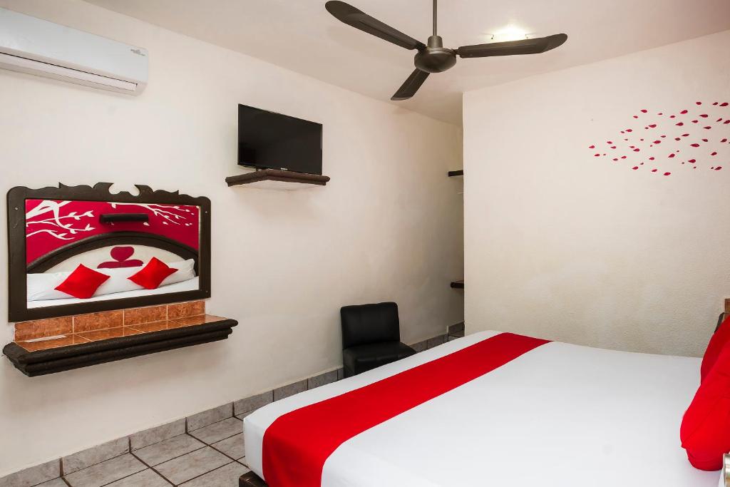Postel nebo postele na pokoji v ubytování Hotel América