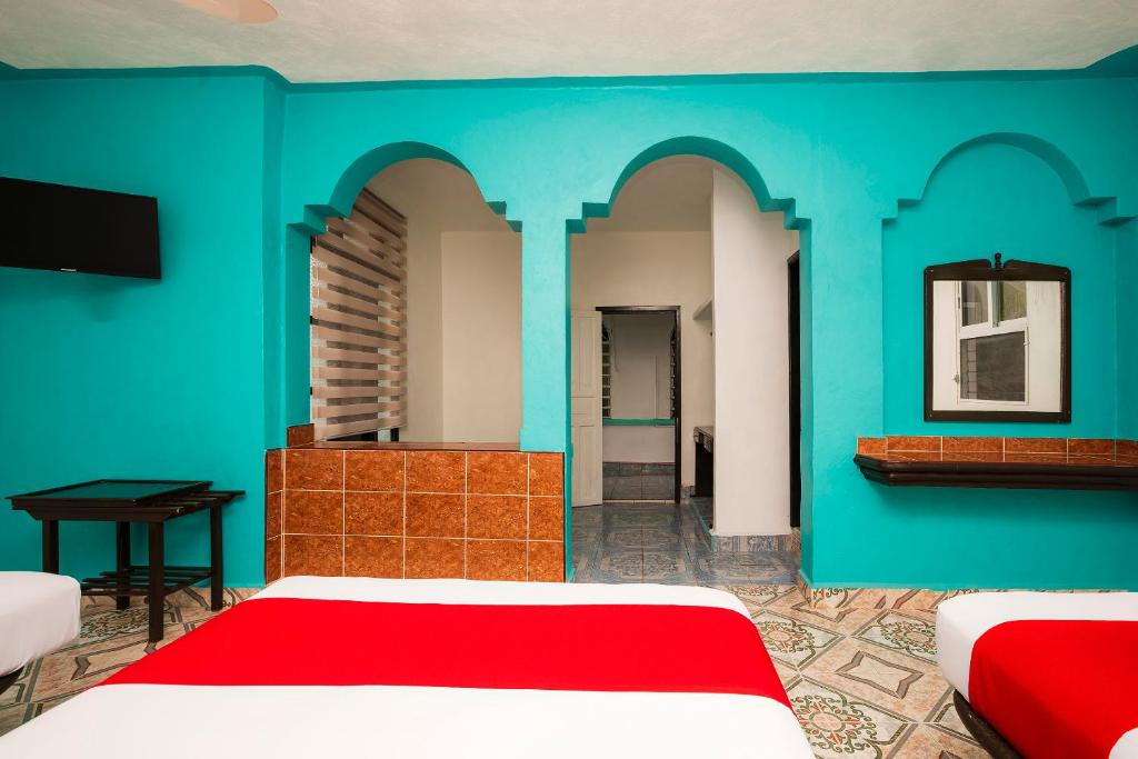 Postel nebo postele na pokoji v ubytování Hotel América