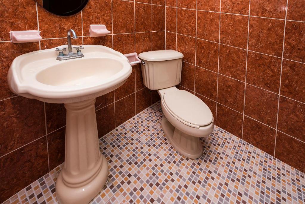 Koupelna v ubytování Hotel América