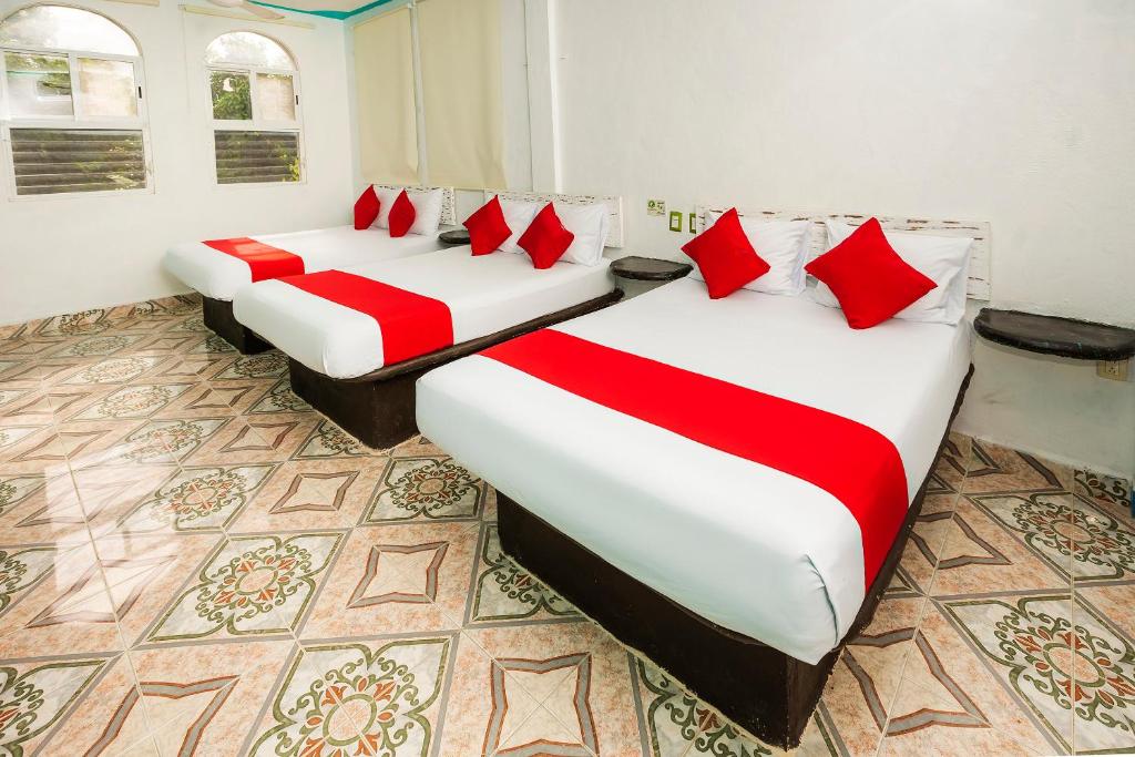Postel nebo postele na pokoji v ubytování Hotel América