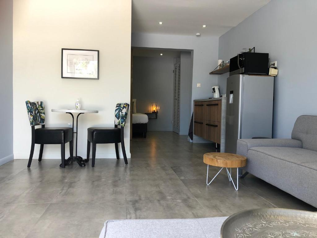 Posezení v ubytování INDIGO Apartments & Suites - 'Adults Only'